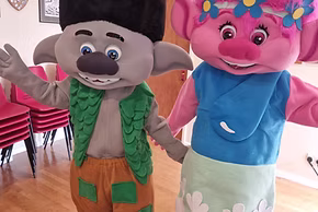 Pink Happy Troll Mascot Appearance